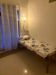 Single occupancy premium room at Sai Kriti Girls PG