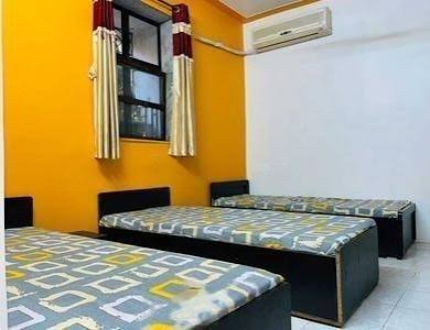 Air-conditioned triple room at Sai Kriti Girls PG
